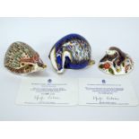 Three Royal Crown Derby Porcelain Paperweights; 'Ashbourne Hedgehog' and 'Buxton Badger', both