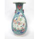 A Late XIX Century Chinese Pear Shaped Pottery Vase, the turquoise famille rose ground painted