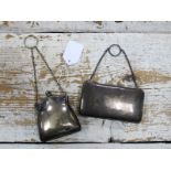 A Silver Plated Finger Purse, of shaped square shape to foliate engraved front, chain handle;