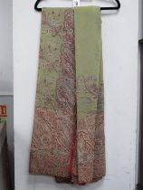 A Late XIX Century Wool Paisley Shawl, in muted red and blue tones around a plain pale green