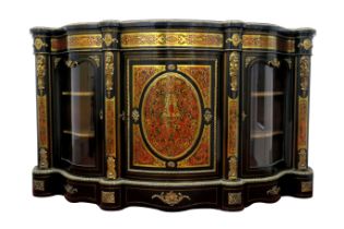 A XIX Century Boulle Ebonised Credenza, the top with gadrooned ormolu edge, over oval shaped