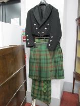 A Gents Scottish Dress Outfit by Kinloch Anderson, tartan kilt with claw kilt pin inset with