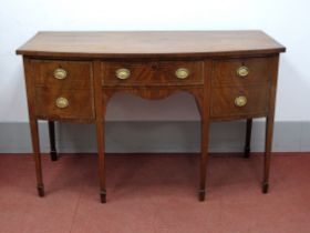 An Early XIX Century Mahogany Bow Fronted Sideboard, with crossbanded inlay to top, central drawer