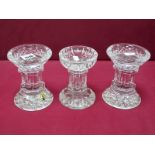 A Pair of Waterford Crystal 'Lismore' Pattern Candle Pillars, etched mark and label, 14cm high;
