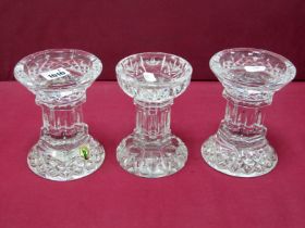 A Pair of Waterford Crystal 'Lismore' Pattern Candle Pillars, etched mark and label, 14cm high;