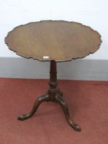 An XVIII Century Mahogany Birdcage Pedestal Table, with piecrust top and turned pedestal on carved
