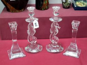 A Pair of Waterford Glass Candlesticks, modelled in the form of seahorses, etched mark, 29cm high; A