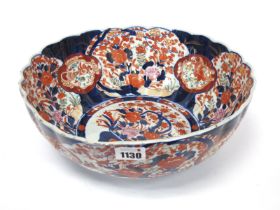 A Late XIX Century Japanese Pottery Bowl, of fluted circular form, decorated in the Imari palette