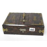 A Mid Victorian Coromandel Box, of rectangular form with brass mounts and handle, applied with