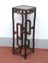 A XIX Century Chinese Hardwood Jardiniére Stand, with a square top, 'C' scroll frieze and shaped