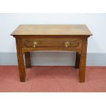 An Early XX Century Art Nouveau Style Oak Side Table, with single drawer, tapering supports with