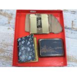 A Ladies Japanese Cigarette Case, with a silvered design of pagodas and Mt. Fuji on a black matt