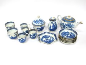 A Part Matched Caughley and Worcester Porcelain Tea Service, decorated in blue with the Fisherman