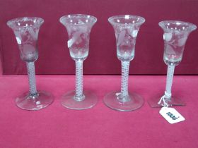 A Set of Four XIX Century Wine Glasses, the bell shaped bowls etched with lily of the valley and