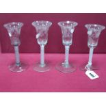 A Set of Four XIX Century Wine Glasses, the bell shaped bowls etched with lily of the valley and