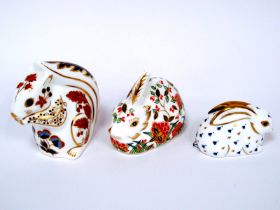 Three Royal Crown Derby Porcelain Paperweights; 'Squirrel', 'Meadow Rabbit' and 'Rabbit', all gold