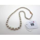 A Vintage Single Strand Graduated Opal Bead Necklace, with faceted glass bead spacers, clasp stamped