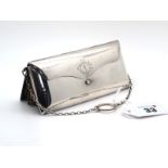 A Hallmarked Silver Purse, (marks rubbed) of plain rounded rectangular form, hinged to top with