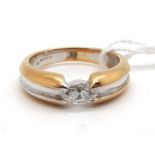 A Modern 18ct Yellow and White Gold Marquise Cut Single Stone Diamond Ring, (finger size N).