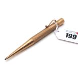 A 9ct Gold Baker's Pointer Pencil, with engine turned decoration and clip, 11.7cm long.