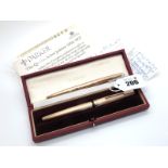 A 9ct Gold Parker Pen, with allover engine turned decoration and engraved "EIIR Silver Jubilee