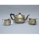 A Hallmarked Silver Three Piece Tea Set, (makers marks rubbed) Sheffield 1915, each of oval form