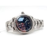 Tag Heuer; A Modern Gent's Wristwatch, Ref: WT1213, the signed blue dial with Arabic numerals,