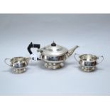 A Hallmarked Silver Three Piece Tea Set, Mappin & Webb, Sheffield 1931, of Art Deco style with