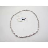 A Modern 18ct White Gold Diamond Set Necklace, of articulated design, collet rubover set to the