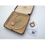 A Singe Strand Graduated Pearl Bead Necklace, together with a 9ct gold mounted compass pendant; a
