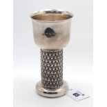 Jack Spencer; A Hallmarked Silver Goblet, Sheffield 1973, the cylindrical stem detailed in relief