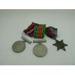 WWII British Medals with Box, including 1939-1945 Star, Defence Medal and Victory Medal