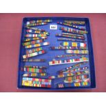 A Collection of Medal Ribbon Bars Relating to The Boar War, WWI, WWII, including mentioned in