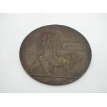 A WWI Memorial Plaque/Death Penny to James Travis.