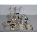 A Plated Four Piece Tea Set, of semi reeded design, together with a plated twin handled tray, pair