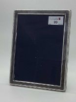 A Modern Hallmarked Silver Rectangular Photograph Frame, RC, 925 (Millennium 2000 mark), on plush