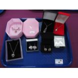 Modern Pendants on Chains, heart shape drop earrings, etc, all boxed.