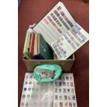 A Box Containing GB, Commonwealth and World Stamps, mint and used in nine albums and in packets