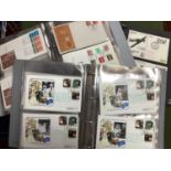 A GB First Day Cover Album of Machin Stamps, and a further album of covers celebrating The