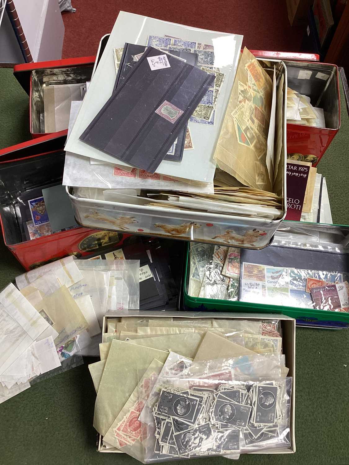 Stamps; British Commonwealth and World stamps stored in five small tins and one box, a good sorted