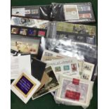 A GB collection of mint stamps in presentation packs and booklets with a face value of over £49 plus
