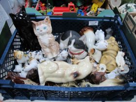 A collection of cat figurines mainly ceramic to include an example by Sherratt & Simpson others