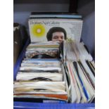 A Quantity of 7" Singles and Selction of LP's, singles from the 60's, 70's and 80's being mainly pop