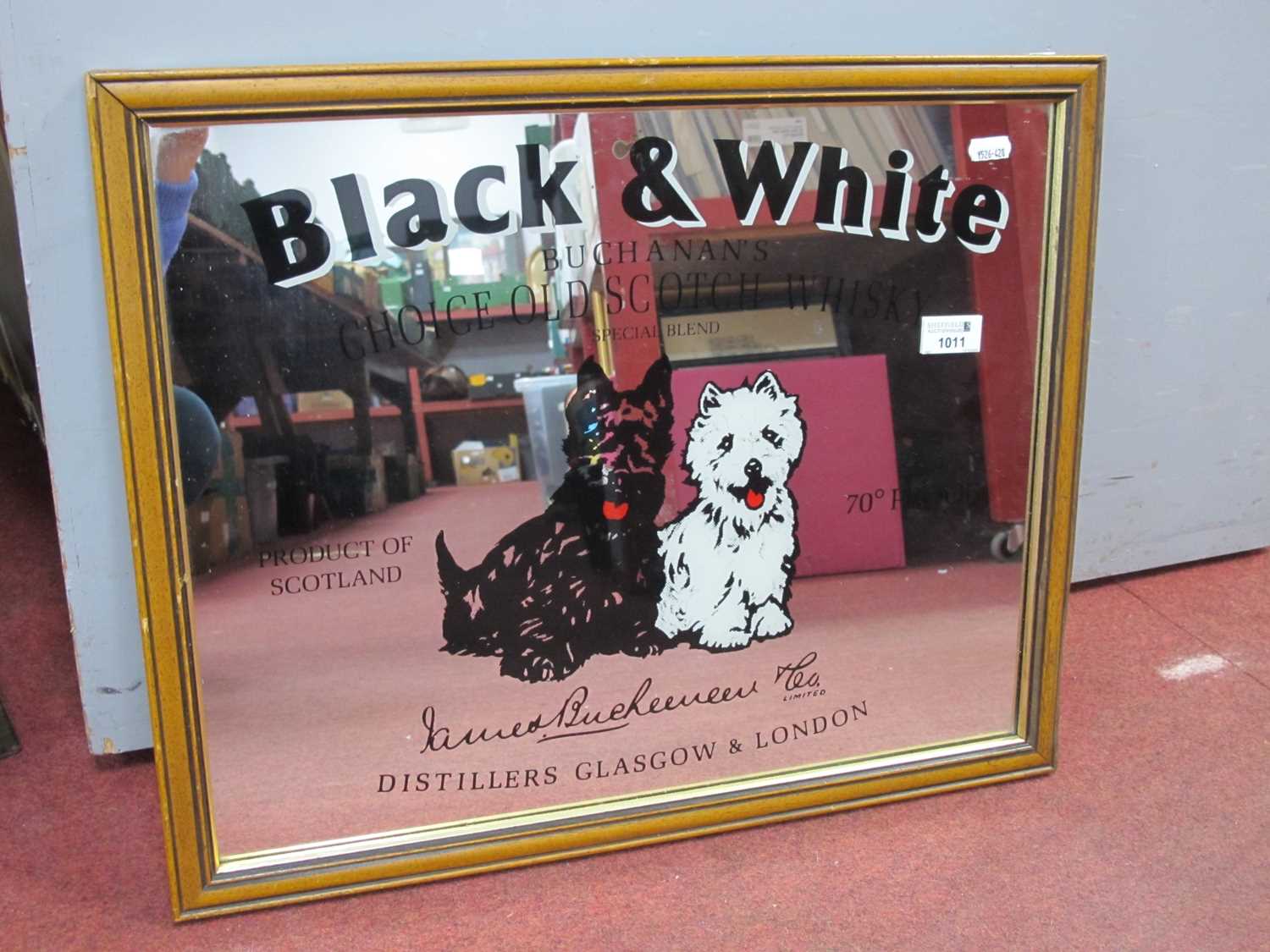 A reproduction 'Black and White Buchanan's choice old scotch whiskey' advertising pub mirror 40 x