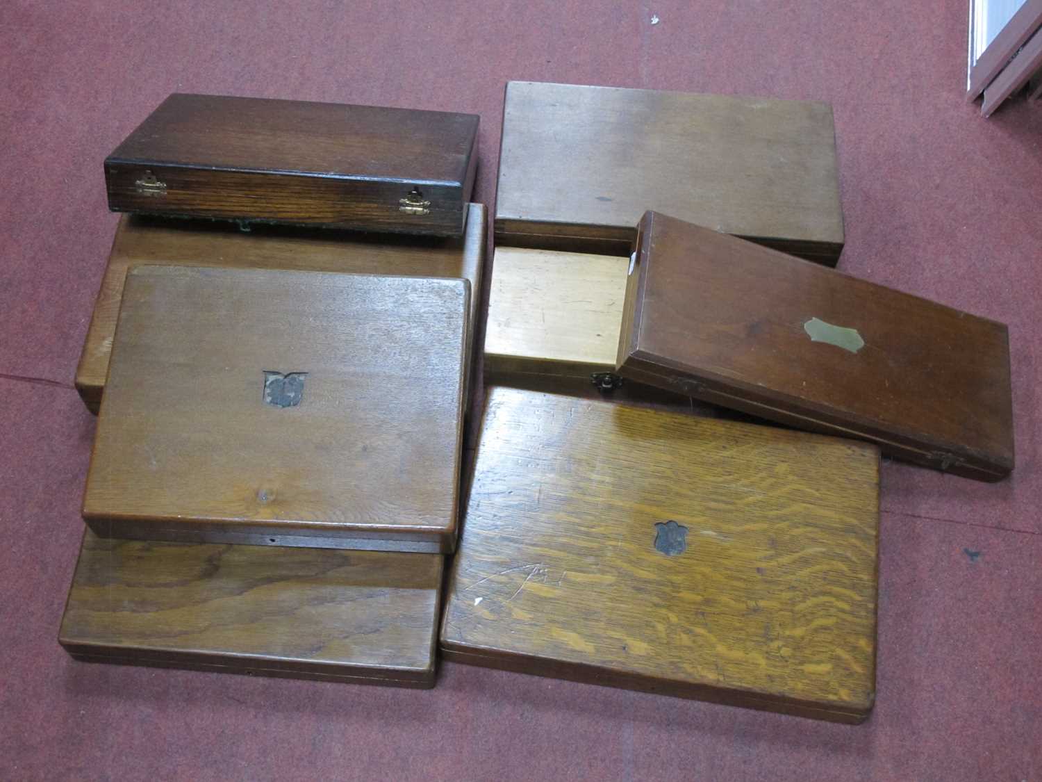 Four Oak Cutlery Canteen Boxes, three others, all with green baize interiors, smaller box with inner