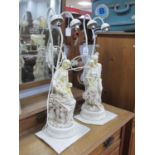 A pair of resin figure table lamps in the form of a couple and couple with baby 66cm h. (2)