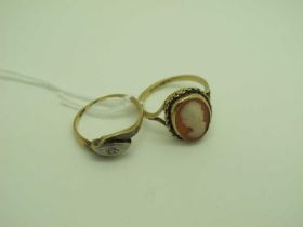 An Oval Shell Carved Cameo Ring, stamped "9ct"; together with a dainty single stone ring, stamped "