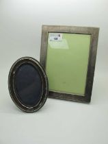 A Hallmarked Silver Mounted Rectangular Photograph Frame, bearing feature hallmarks, on wooden easel