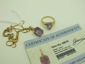 A Modern Amethyst and Diamond Pendant, claw set with millegrain highlights (*GEMS TV Certificate