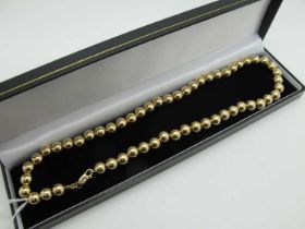 A Modern "925" Gilt Ball Bead Necklace, 43.5cm long.